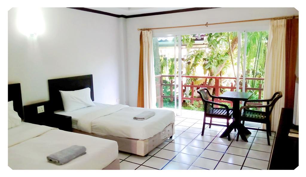 Thong Paeka Hotel Prasat Стая снимка